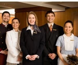 A group of trainees in professional uniforms